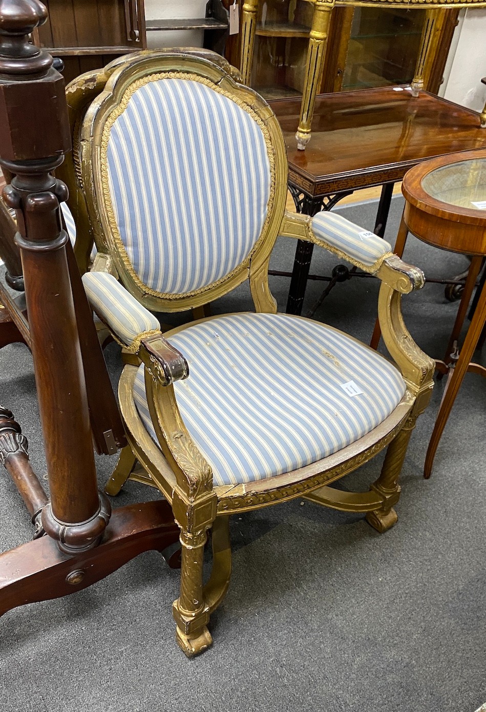 A pair of 19th century French carved giltwood fauteuils, width 63cm, depth 51cm, height 99cm